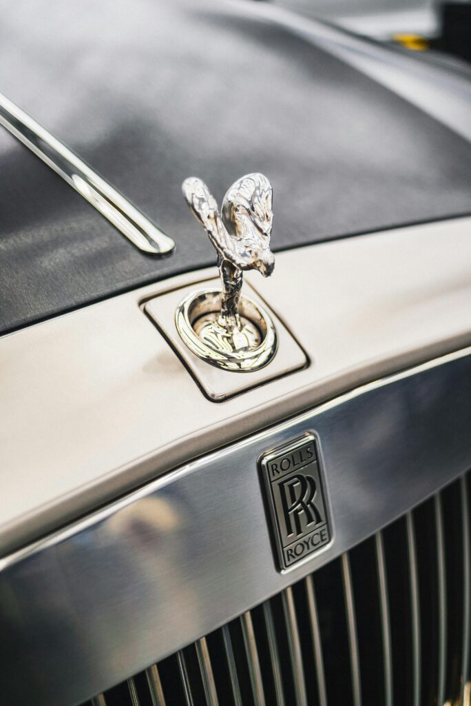 Close-up Photo of Rolls Royce Car Emblem